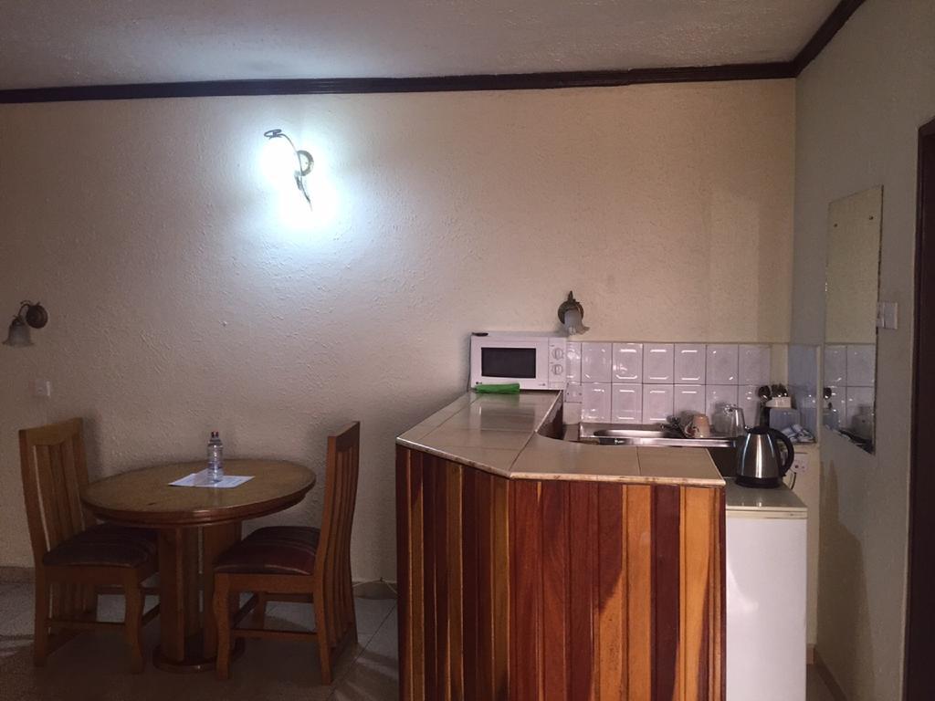 Hotel De Texas Kumasi Szoba fotó