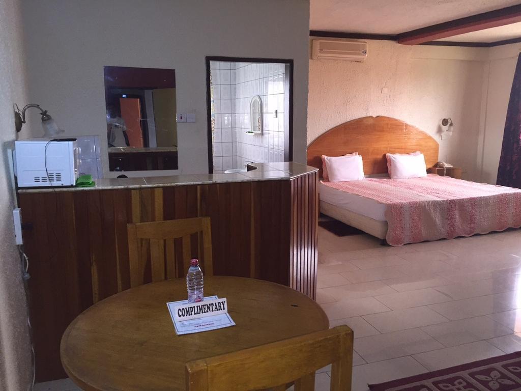 Hotel De Texas Kumasi Szoba fotó